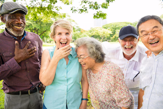 group diverse elderly friends laughing outdoors elderly joy diverse smiles outdoor fun happy elderly group enjoying laughter friendship diverse elderly people laughing 53876 1126500